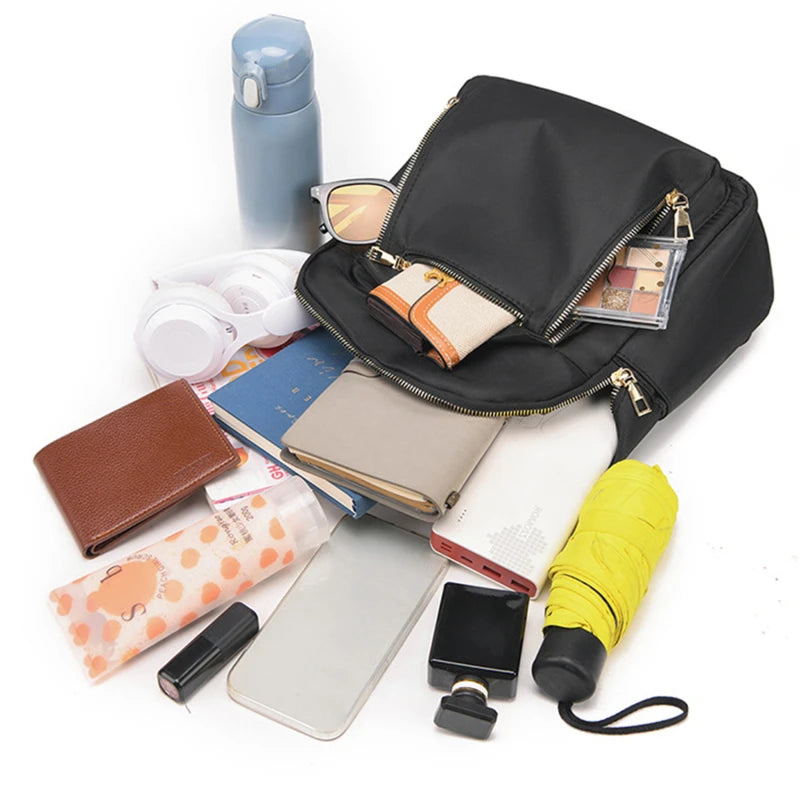 Mochila feminina de viagem casual à prova d'água Oxford bolsa de ombro feminina grande capacidade bolsa preta bolsa escolar