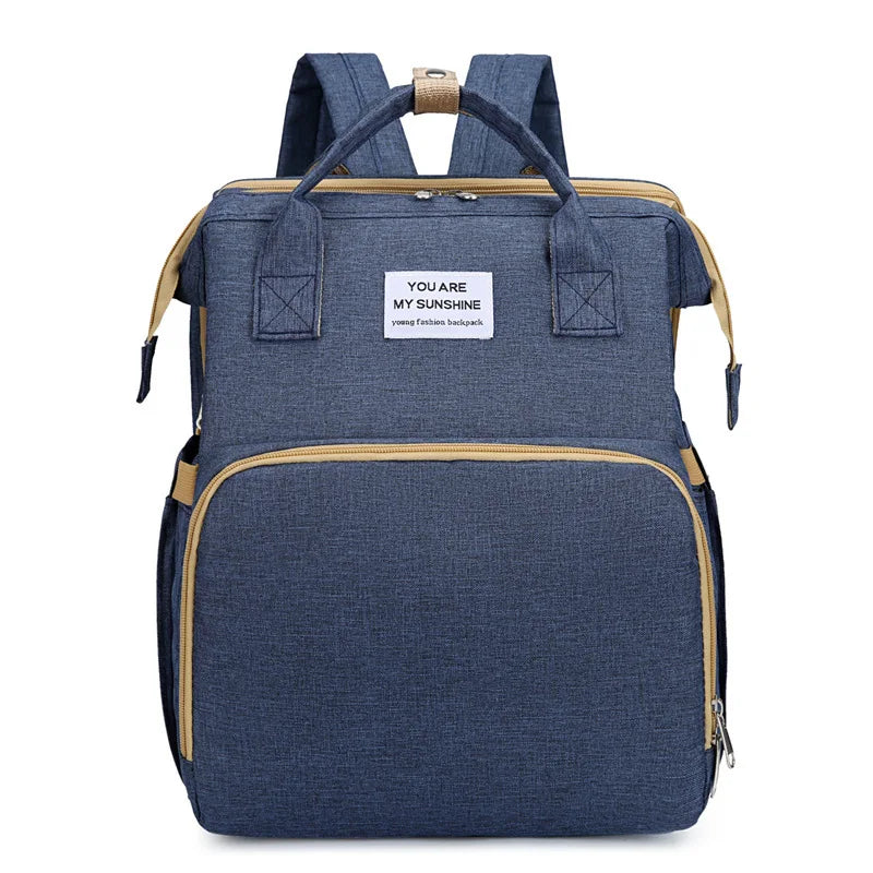A nova cama dobrável tipo mochila de 2025 é uma cama portátil para bebês, ideal para viagens e passeios, além de ser uma cama tipo mochila resistente à pressão.