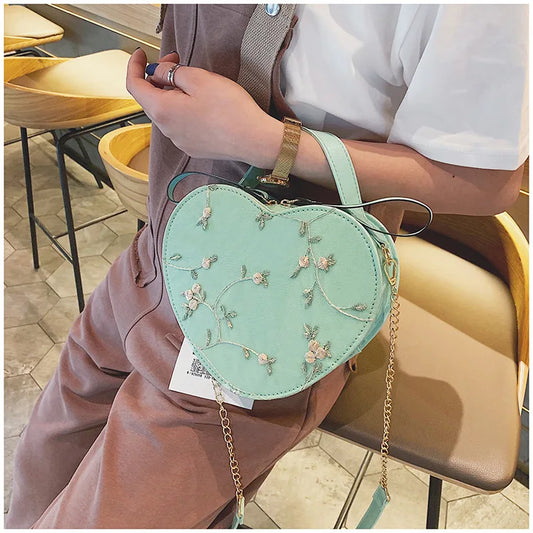 Bolsas redondas de renda doce de couro PU de alta qualidade para mulheres, bolsas crossbody para mulheres 2025, pequena corrente de flores frescas, ombro