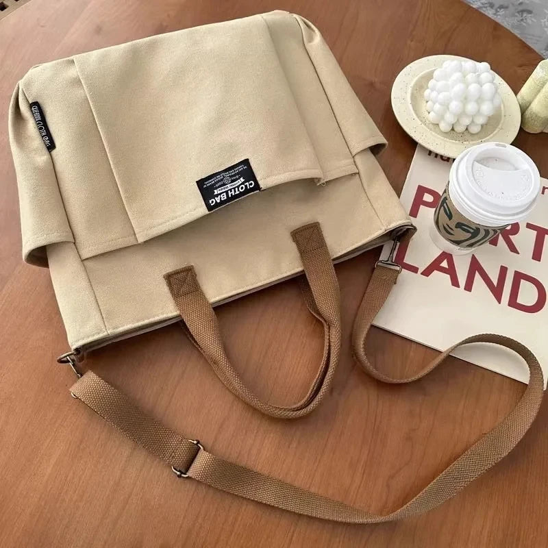 Bolsa tote portátil urbana minimalista, grande capacidade, para estudantes, de lona horizontal, com um ombro, diagonal e transversal