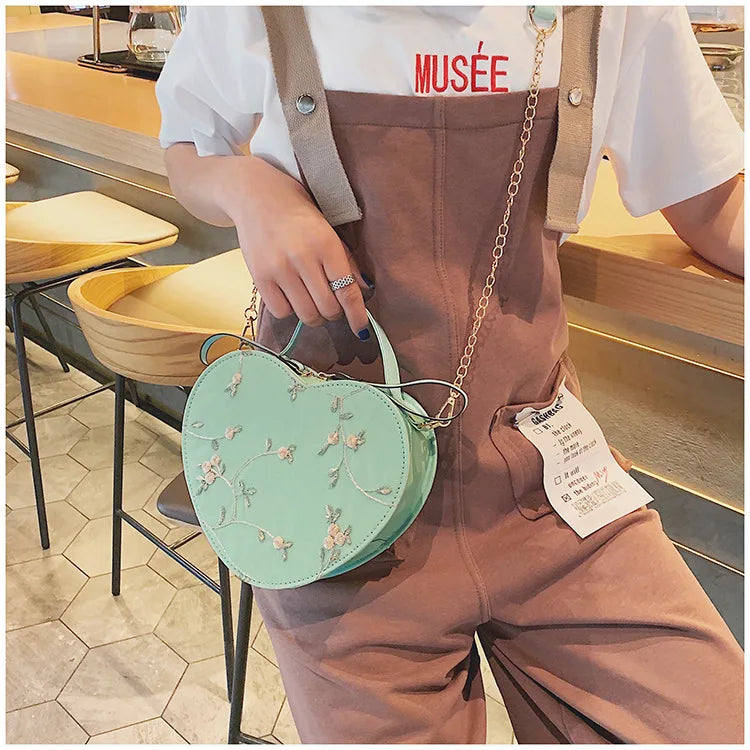 Bolsas redondas de renda doce de couro PU de alta qualidade para mulheres, bolsas crossbody para mulheres 2025, pequena corrente de flores frescas, ombro