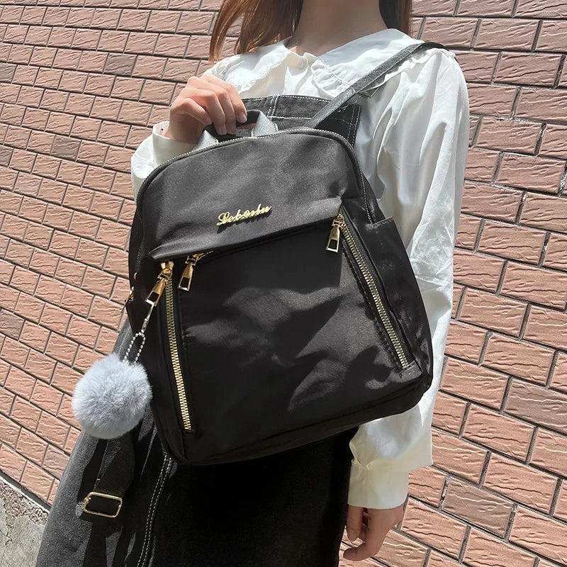 Mochila feminina de viagem casual à prova d'água Oxford bolsa de ombro feminina grande capacidade bolsa preta bolsa escolar