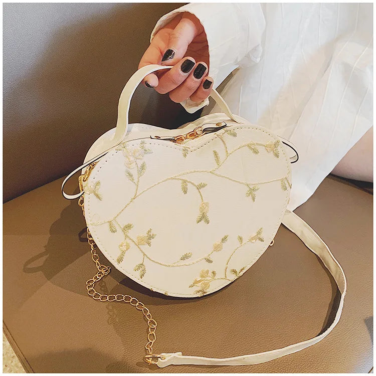 Bolsas redondas de renda doce de couro PU de alta qualidade para mulheres, bolsas crossbody para mulheres 2025, pequena corrente de flores frescas, ombro
