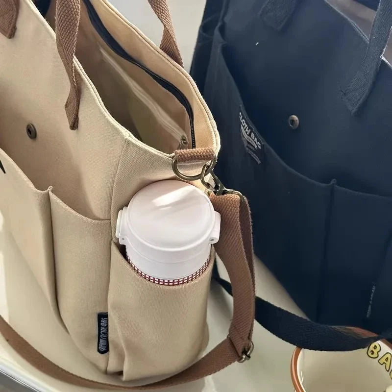 Bolsa tote portátil urbana minimalista, grande capacidade, para estudantes, de lona horizontal, com um ombro, diagonal e transversal