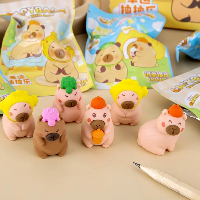 32 unidades/caixa bolsa surpresa de capivara fofa com desenho animado borracha material de papelaria para estudantes atacado